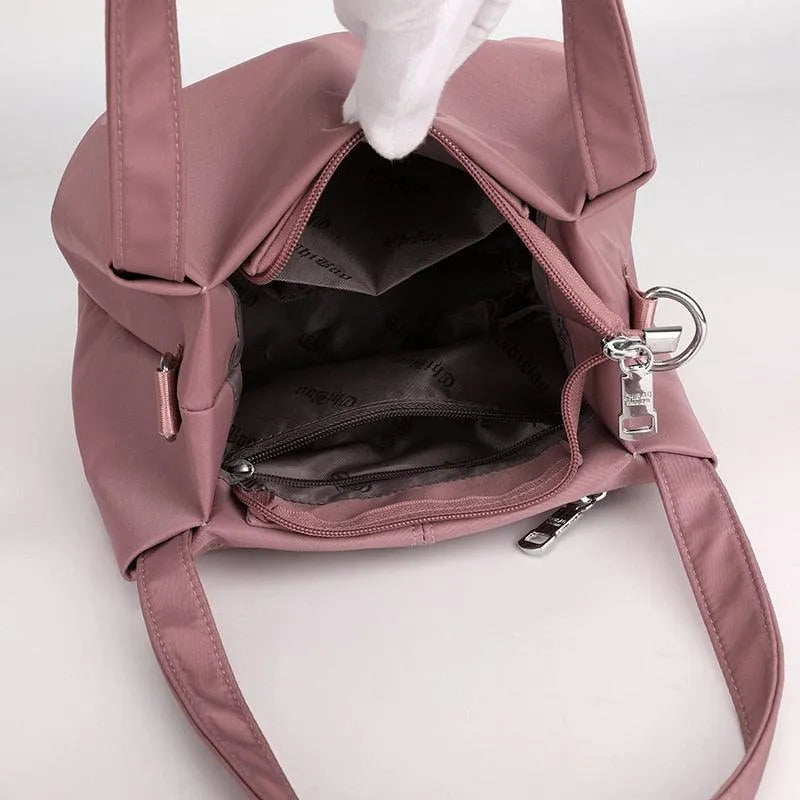 Bolsa Feminina Transversal Impermeável - BellaSling - Site compre mais